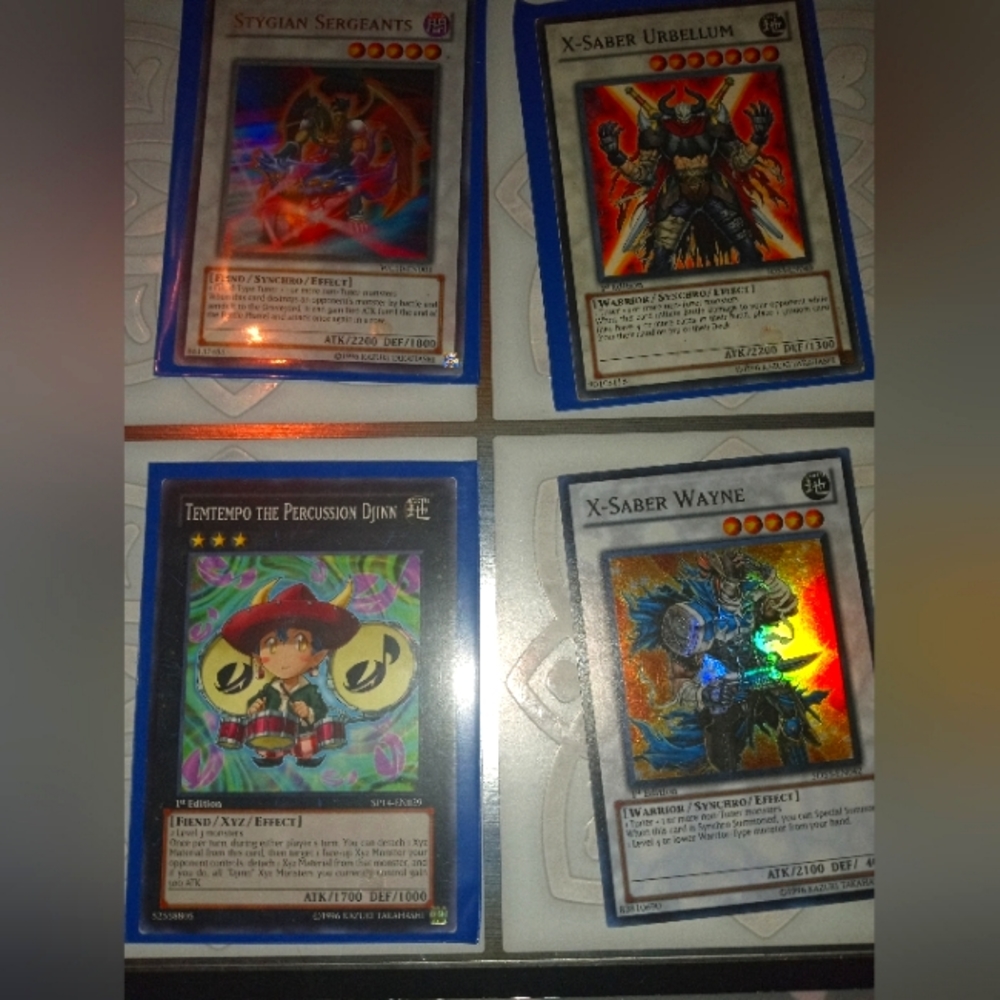 Set of 4 holographic yugioh cards